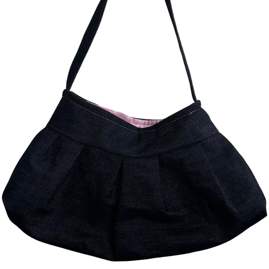 denim “babydoll” bag